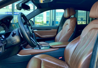 Подержанный автомобиль BMW X6 2014 года (23 фото)