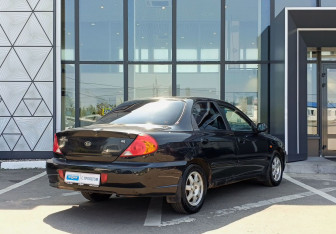 Подержанный автомобиль Kia Spectra Sedan 2006 года (5 фото)