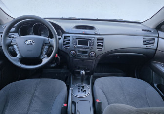 Подержанный автомобиль Kia Magentis 2010 года (11 фото)