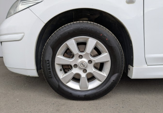 Подержанный автомобиль Nissan Tiida Sedan 2012 года (12 фото)