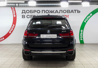 Подержанный автомобиль BMW X5 2014 года (5 фото)