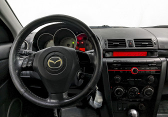 Подержанный автомобиль Mazda 3 Hatchback 2008 года (21 фото)