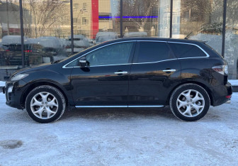 Подержанный автомобиль Mazda CX-7 2011 года (5 фото)