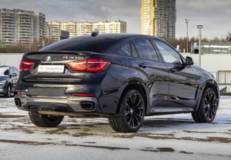Подержанный автомобиль BMW X6 2015 года (5 фото)