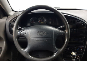 Подержанный автомобиль Kia Spectra Sedan 2007 года (14 фото)