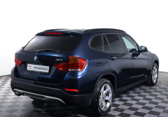Подержанный автомобиль BMW X1 2014 года (5 фото)