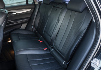 Подержанный автомобиль BMW X6 2015 года (15 фото)