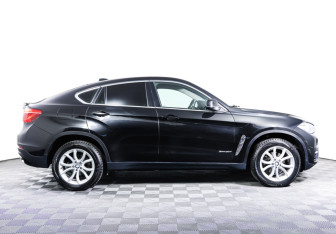 Подержанный автомобиль BMW X6 2015 года (4 фото)