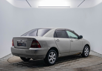 Подержанный автомобиль Toyota Corolla Sedan 2001 года (5 фото)