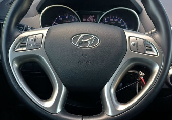 Подержанный автомобиль Hyundai ix35 2012 года (13 фото)