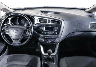 Подержанный автомобиль Kia Ceed Wagon 2014 года (12 фото)