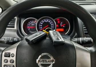 Подержанный автомобиль Nissan Tiida Hatchback 2012 года (15 фото)