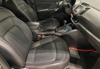 Подержанный автомобиль Kia Sportage 2010 года (9 фото)