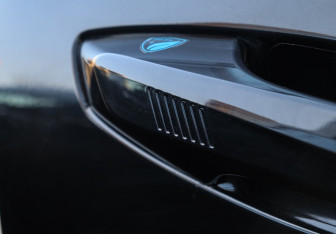 Подержанный автомобиль Geely Atlas 2024 года (13 фото)