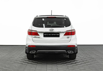 Подержанный автомобиль Hyundai Santa Fe 2014 года (4 фото)