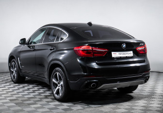 Подержанный автомобиль BMW X6 2016 года (7 фото)