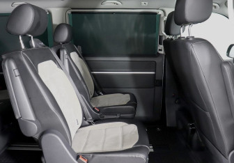 Подержанный автомобиль Volkswagen Multivan 2016 года (14 фото)
