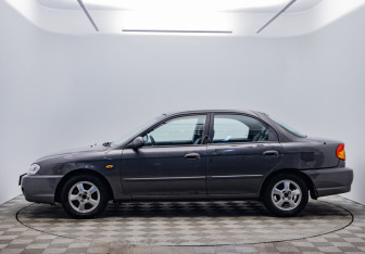 Подержанный автомобиль Kia Spectra Sedan 2006 года (8 фото)