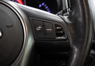 Подержанный автомобиль Kia Cerato Coupe 2012 года (20 фото)