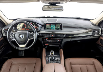 Подержанный автомобиль BMW X6 2018 года (14 фото)
