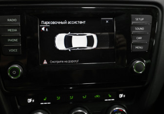 Подержанный автомобиль Skoda Octavia Liftback 2014 года (17 фото)