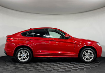 Подержанный автомобиль BMW X4 2015 года (6 фото)