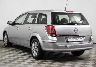 Подержанный автомобиль Opel Astra Wagon 2014 года (7 фото)