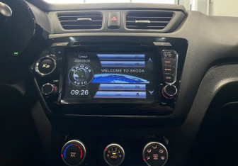 Подержанный автомобиль Kia Rio Sedan 2015 года (16 фото)