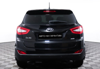 Подержанный автомобиль Hyundai ix35 2014 года (6 фото)