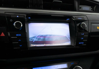 Подержанный автомобиль Toyota Corolla Sedan 2014 года (9 фото)