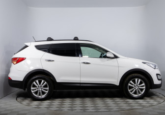 Подержанный автомобиль Hyundai Santa Fe 2014 года (4 фото)