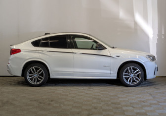 Подержанный автомобиль BMW X4 2015 года (4 фото)