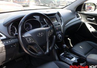 Подержанный автомобиль Hyundai Santa Fe 2016 года (10 фото)
