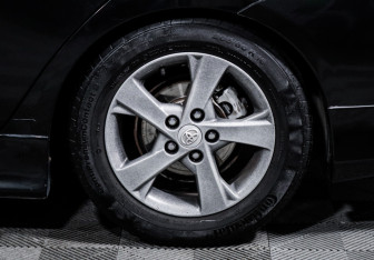 Подержанный автомобиль Toyota Corolla Sedan 2012 года (15 фото)