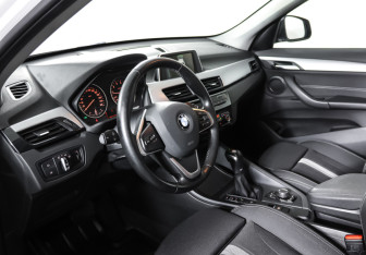 Подержанный автомобиль BMW X1 2015 года (15 фото)