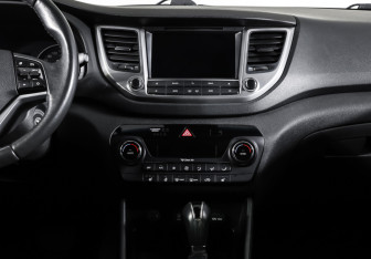 Подержанный автомобиль Hyundai Tucson 2016 года (14 фото)