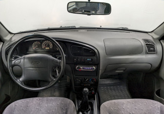 Подержанный автомобиль Kia Spectra Sedan 2007 года (19 фото)