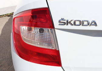 Подержанный автомобиль Skoda Rapid Liftback 2014 года (24 фото)