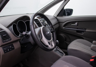 Подержанный автомобиль Kia Venga 2013 года (10 фото)