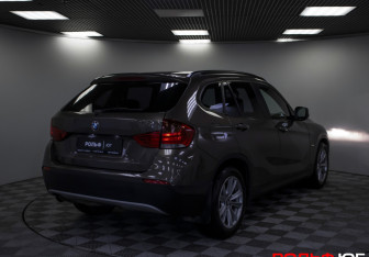 Подержанный автомобиль BMW X1 2012 года (20 фото)