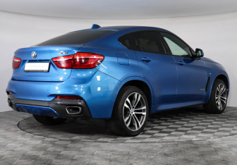 Подержанный автомобиль BMW X6 2018 года (2 фото)