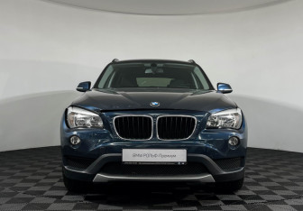 Подержанный автомобиль BMW X1 2014 года (3 фото)
