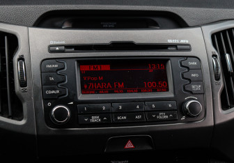 Подержанный автомобиль Kia Sportage 2012 года (18 фото)