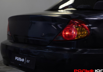 Подержанный автомобиль Kia Spectra Sedan 2006 года (16 фото)