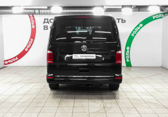 Подержанный автомобиль Volkswagen Multivan 2016 года (5 фото)