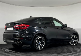 Подержанный автомобиль BMW X6 2016 года (2 фото)