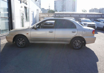 Подержанный автомобиль Kia Spectra Sedan 2009 года (8 фото)