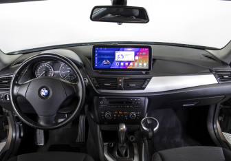 Подержанный автомобиль BMW X1 2013 года (12 фото)