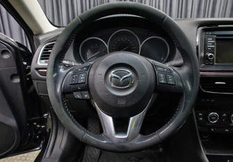 Подержанный автомобиль Mazda 6 Sedan 2014 года (17 фото)