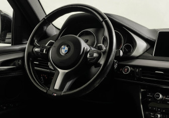 Подержанный автомобиль BMW X6 2018 года (15 фото)